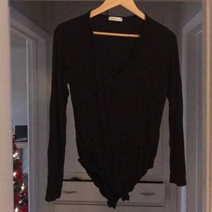 Black v-neck vertical stripes shirt, size XL.